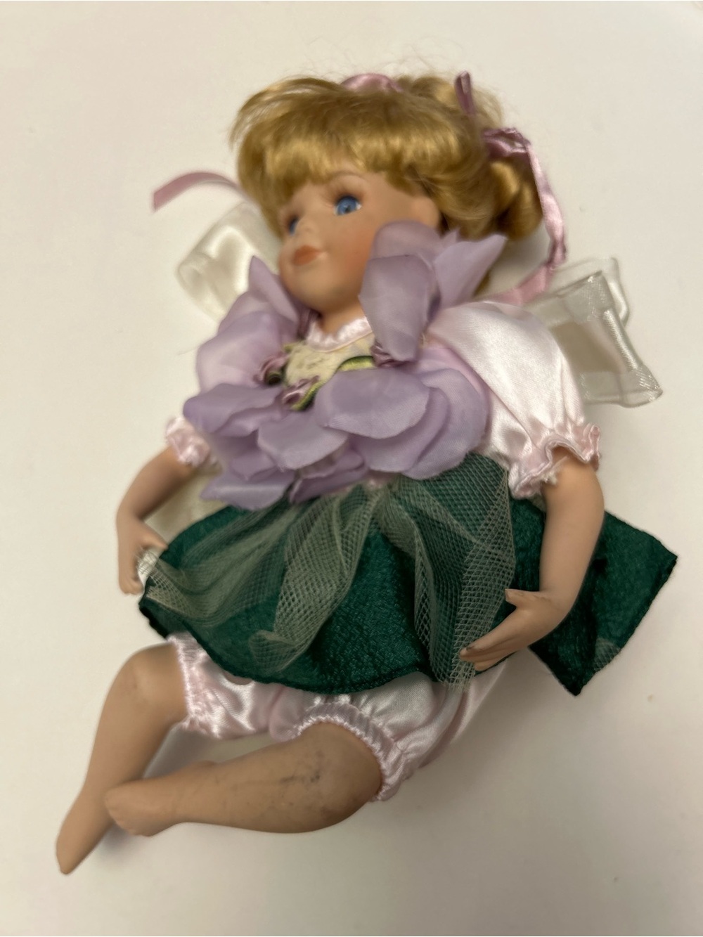Vintage Porcelain Doll with Pink Outfit and Green Tulle Skirt